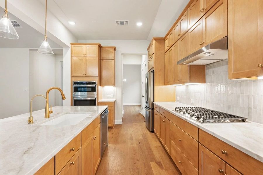 Furnished interior view inside a new home in The Estates at La Cima, San Marcos (Image 10).