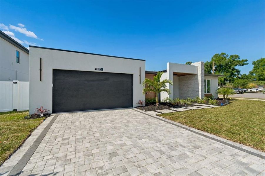 Front exterior of a new home in , Tampa, FL, highlighting curb appeal (Image 23).