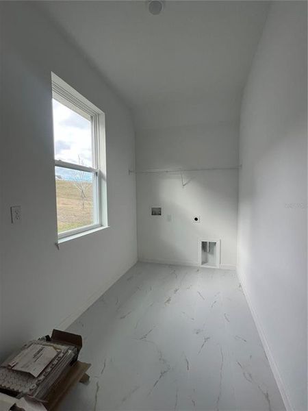 In-progress construction of a new home in Hills of Minneola, Minneola, FL (Image 27).