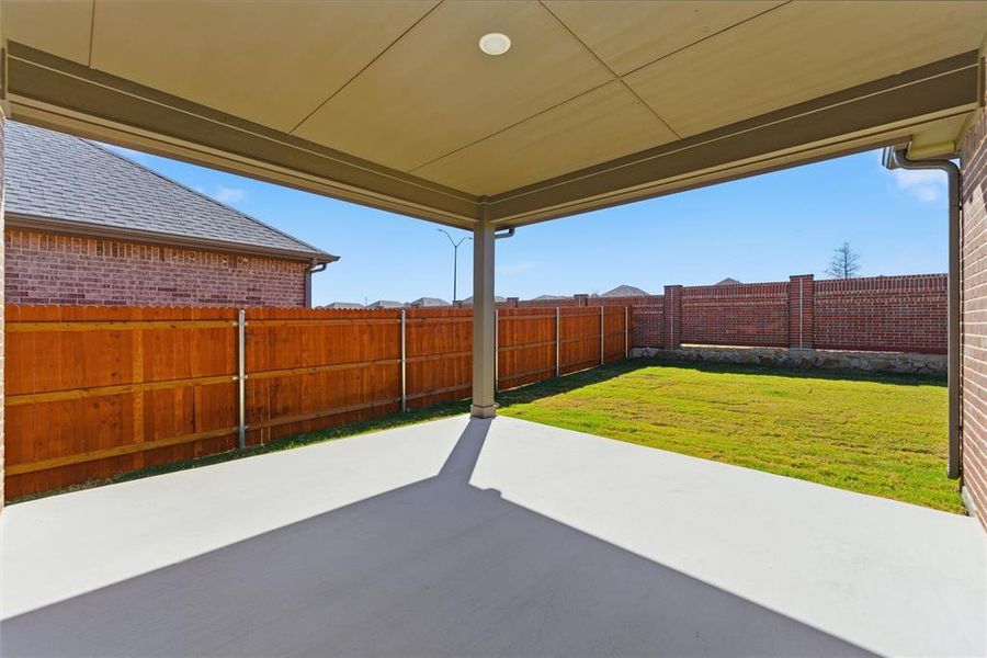 Exterior details and patio area of a home in Northstar, Haslet (Image 24).