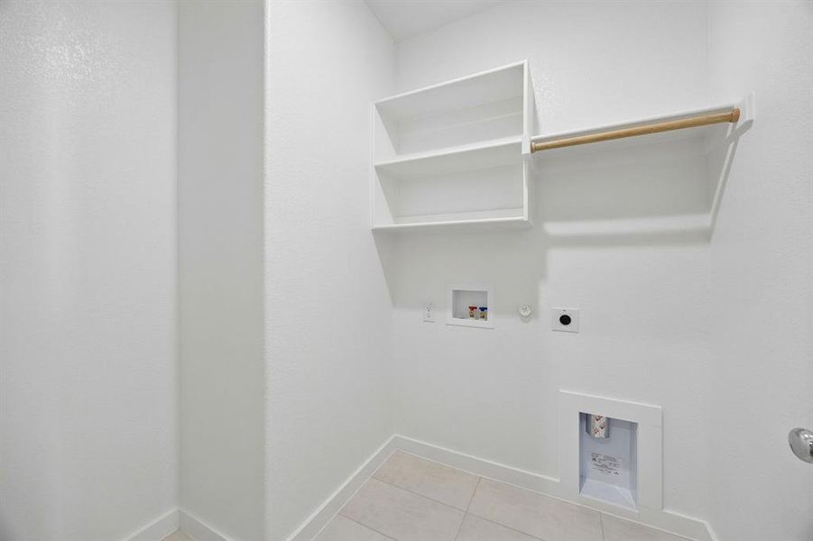 Utility Room in the Emmy II home plan by Trophy Signature Homes - REPRESENTATIVE PHOTO