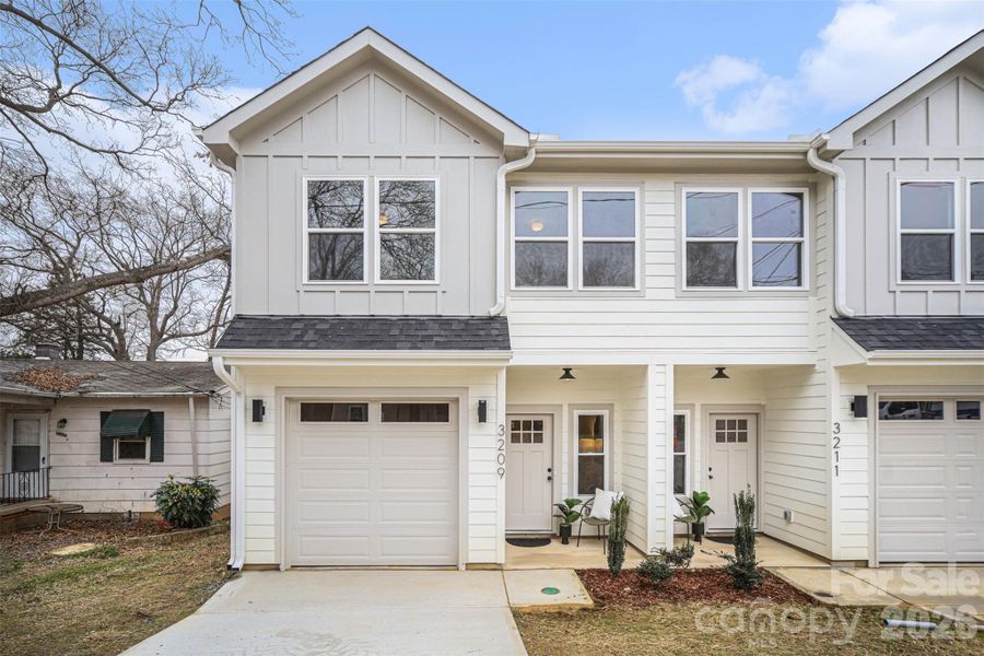 Front exterior of a new home in , Charlotte, NC, highlighting curb appeal (Image 27).
