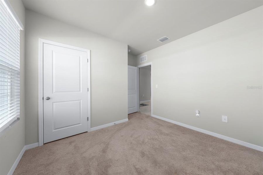 Spacious, unfurnished interior of a new home in , Port Charlotte (Image 24).