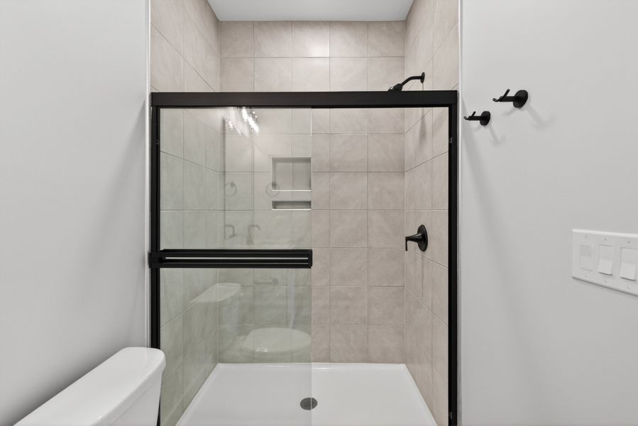 Representative furnished interior of a home built from the Atlas Interior Unit by Baker Residential in Atwater Station - Midtown Collection, Fuquay Varina (Image 17).