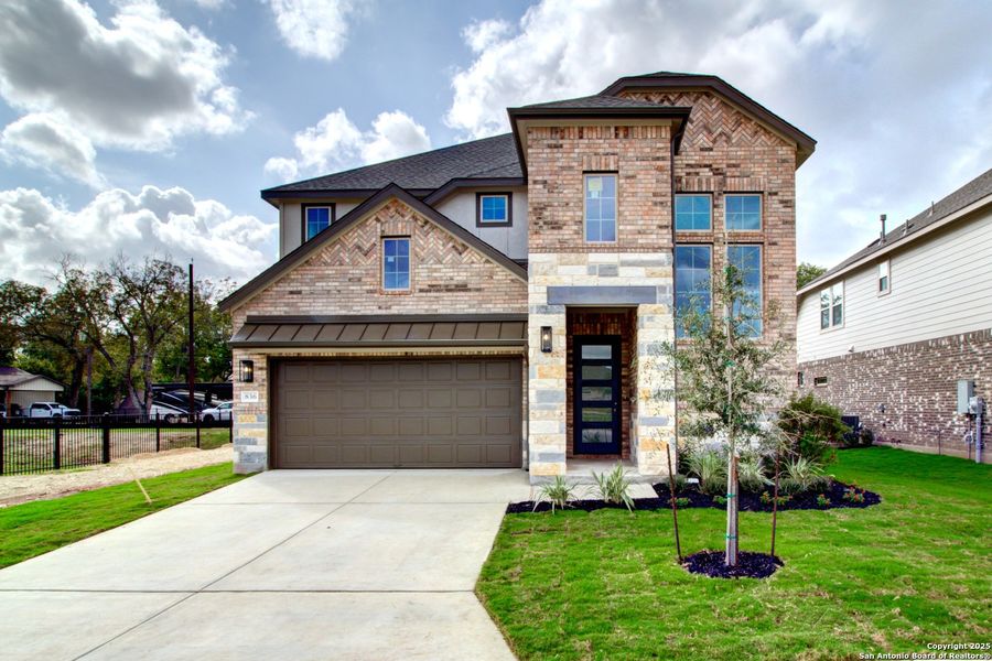 Front exterior of a new home in Clear Creek, New Braunfels, TX, highlighting curb appeal (Image 1). Front exterior of a new home in Clear Creek, New Braunfels, TX, highlighting curb appeal (Image 1).