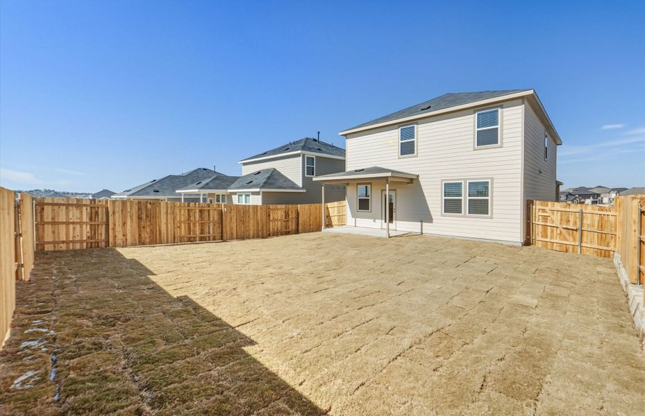 Exterior details and patio area of a home in Sunfield, Buda (Image 22).