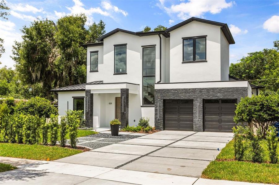 Front exterior of a new home in , Winter Park, FL, highlighting curb appeal (Image 24).