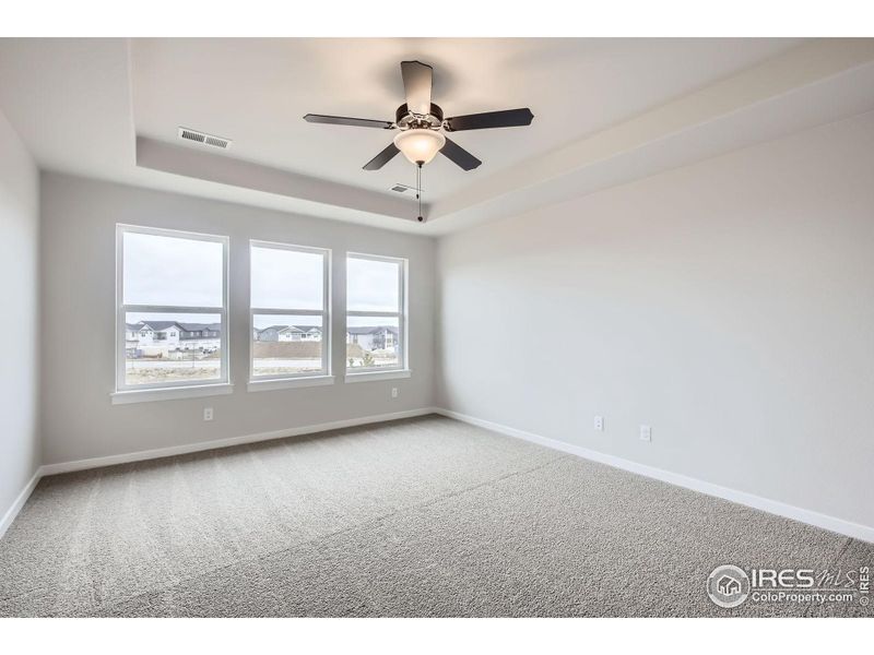 Spacious, unfurnished interior of a new home in RainDance - 60s, Windsor (Image 35).