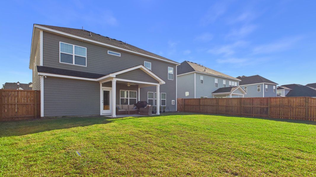 Exterior details and patio area of a home in Hewing Farms, Summerville (Image 3).