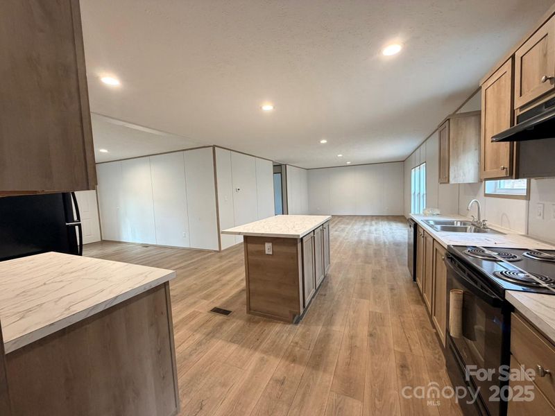 Furnished interior view inside a new home in , Statesville (Image 6).