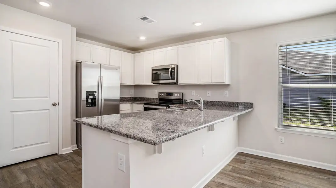 Furnished interior view inside a new home in Southshore Bay, Sunset Beach (Image 4).
