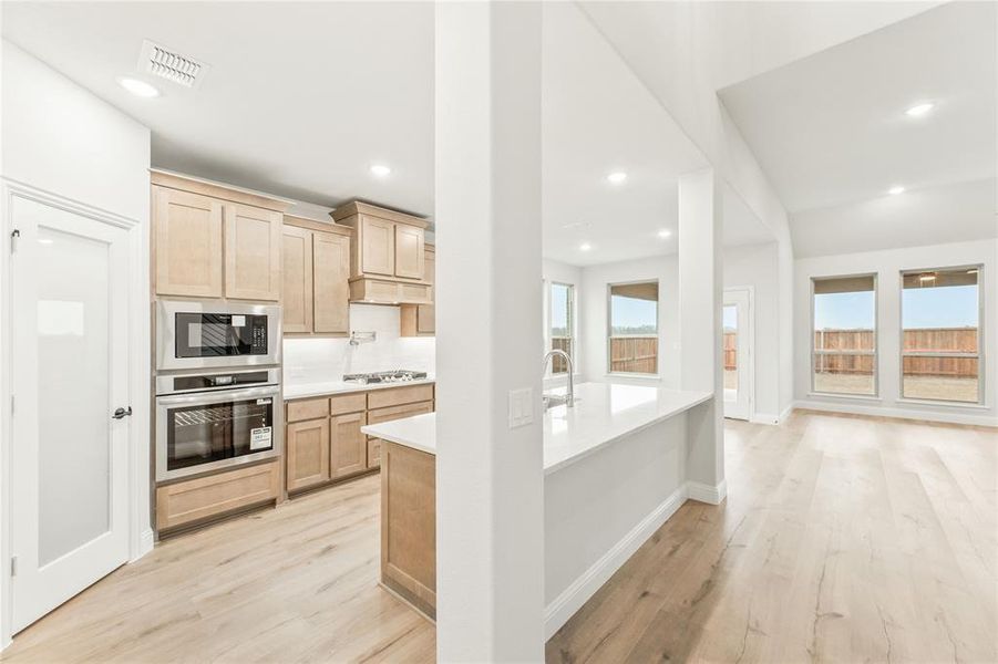 Furnished interior view inside a new home in Stone River Glen, Royse City (Image 10).