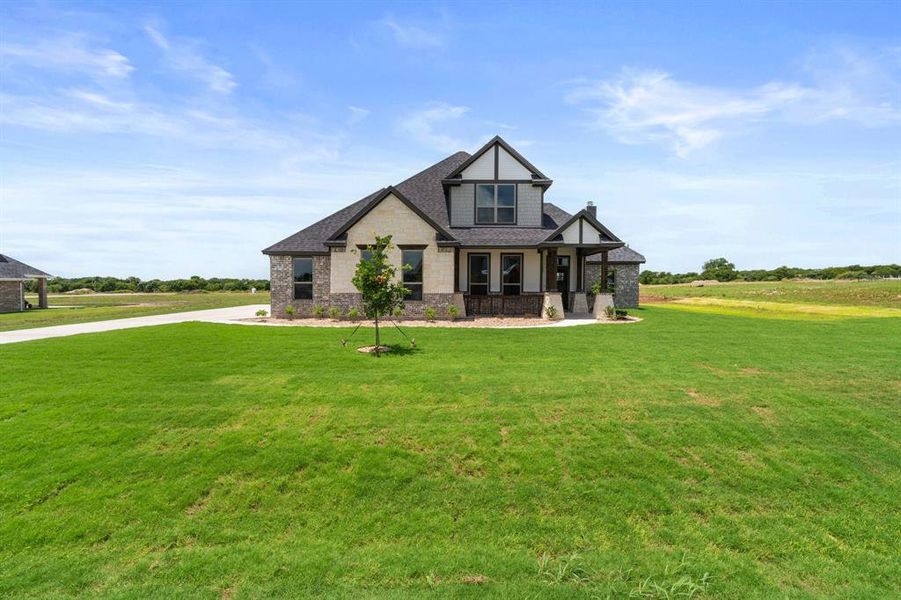 Front exterior of a new home in , Waxahachie, TX, highlighting curb appeal (Image 21).