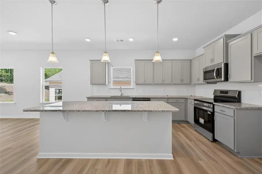 Furnished interior view inside a new home in Summerfield Place, Carrollton (Image 5).