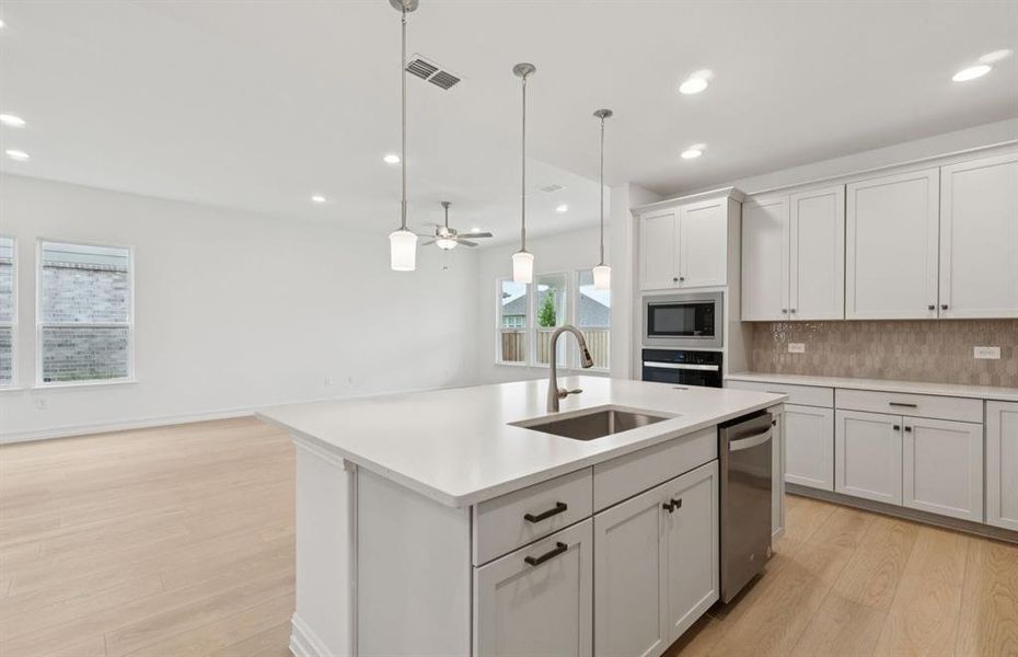 Gourmet kitchen designed for culinary excellence and entertaining  *Real home pictured