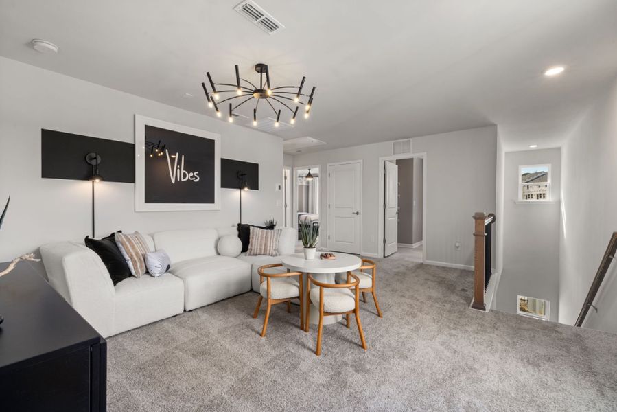 Furnished interior view inside a new home in Huxley, Apex (Image 14). Furnished interior view inside a new home in Huxley, Apex (Image 14).