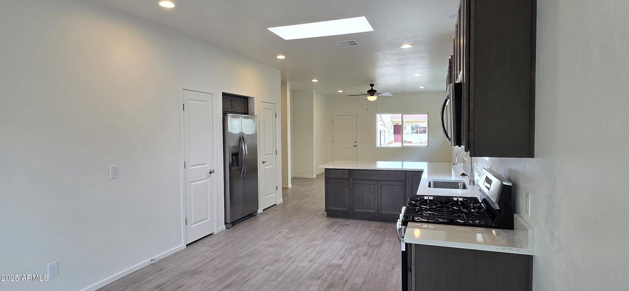 Kitchen from Dining Area Kitchen from Dining Area