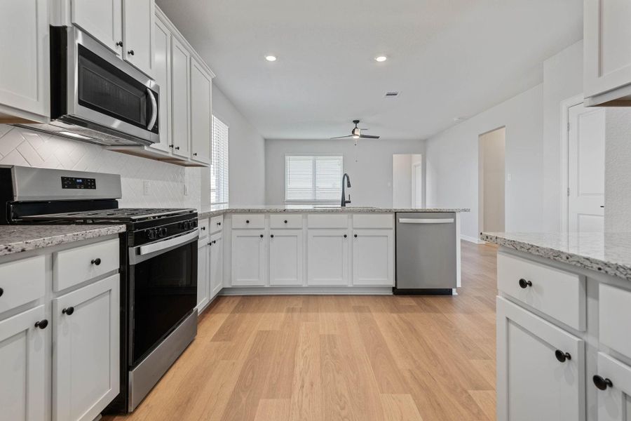 Furnished interior view inside a new home in Emberly, Beasley (Image 3).