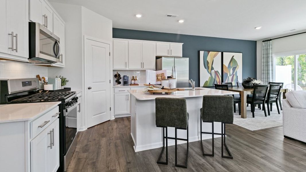 Representative furnished interior of a home built from the CARSON - TRADITIONS by D.R. Horton in Chapel Townes, Raleigh (Image 5).