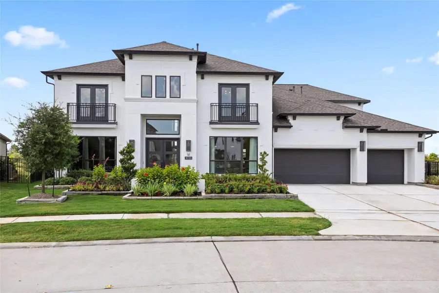 Front exterior of a new home in Bridgeland, Cypress, TX, highlighting curb appeal (Image 21).