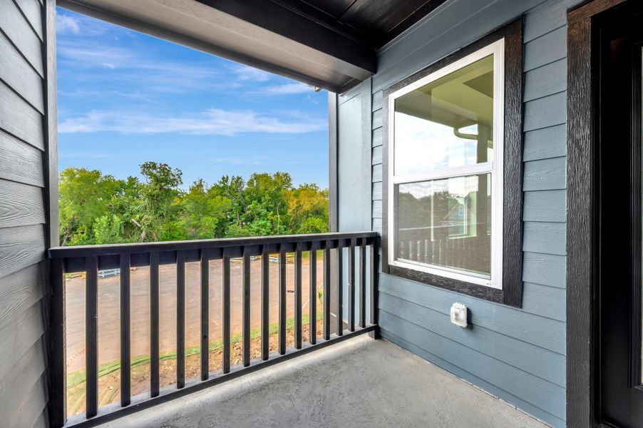 Exterior details and patio area of a home in Trails at Waterside - Villas Series, Fort Worth (Image 3).