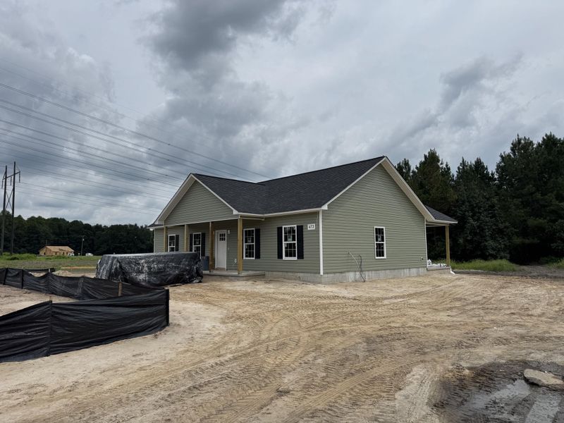 Front exterior of a new home in , St. George, SC, highlighting curb appeal (Image 15).