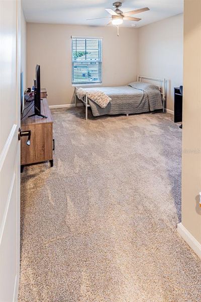 Furnished interior view inside a new home in Seasons at Lakeside Forest, Tavares (Image 15).