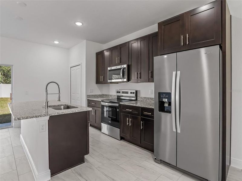 Furnished interior view inside a new home in , Ocala (Image 12).