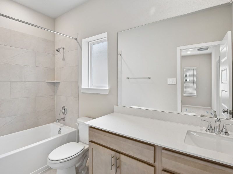 Furnished interior view inside a new home in Parkway Commons - City Series, Missouri City (Image 10).