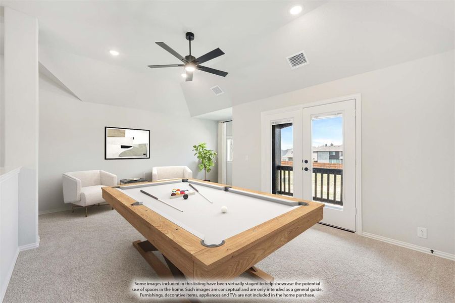 Game room with wood pool table, vaulted ceiling, ceiling fan, and French doors to outdoor deck