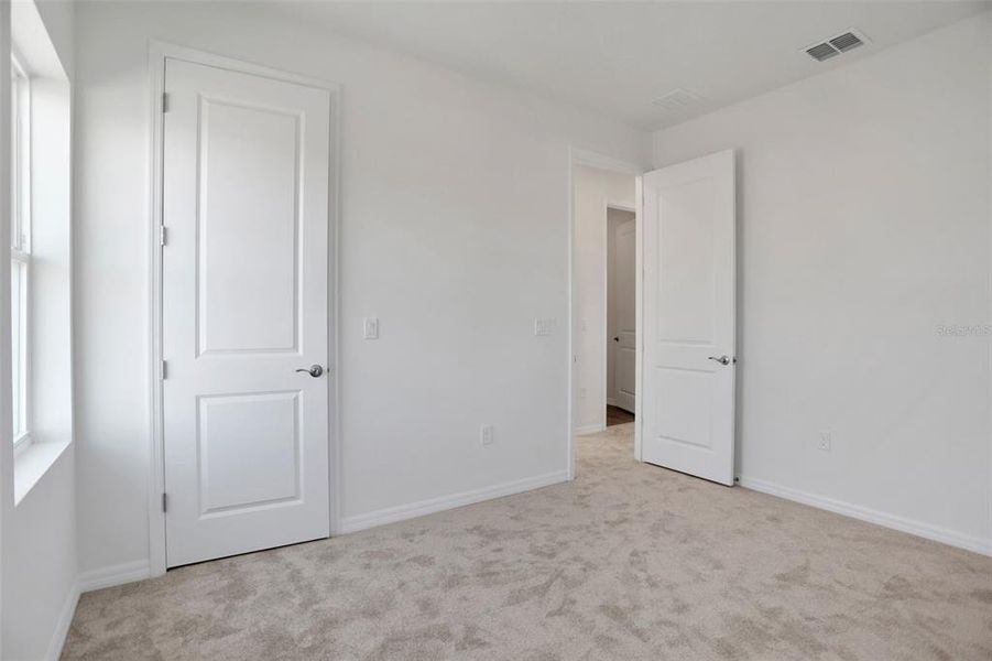 Spacious, unfurnished interior of a new home in Turnleaf, Punta Gorda (Image 27). Spacious, unfurnished interior of a new home in Turnleaf, Punta Gorda (Image 27).