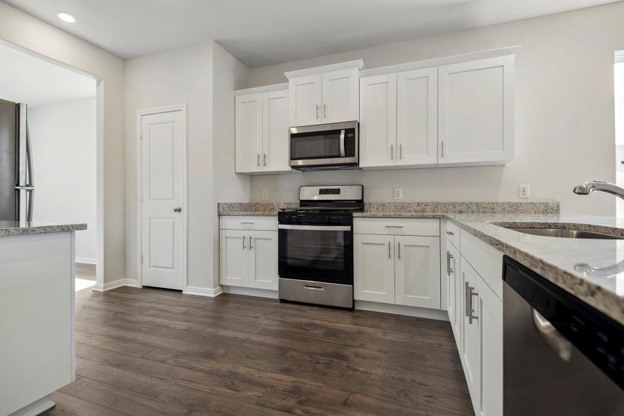 Furnished interior view inside a new home in Sweetwater Ridge, Conroe (Image 6).