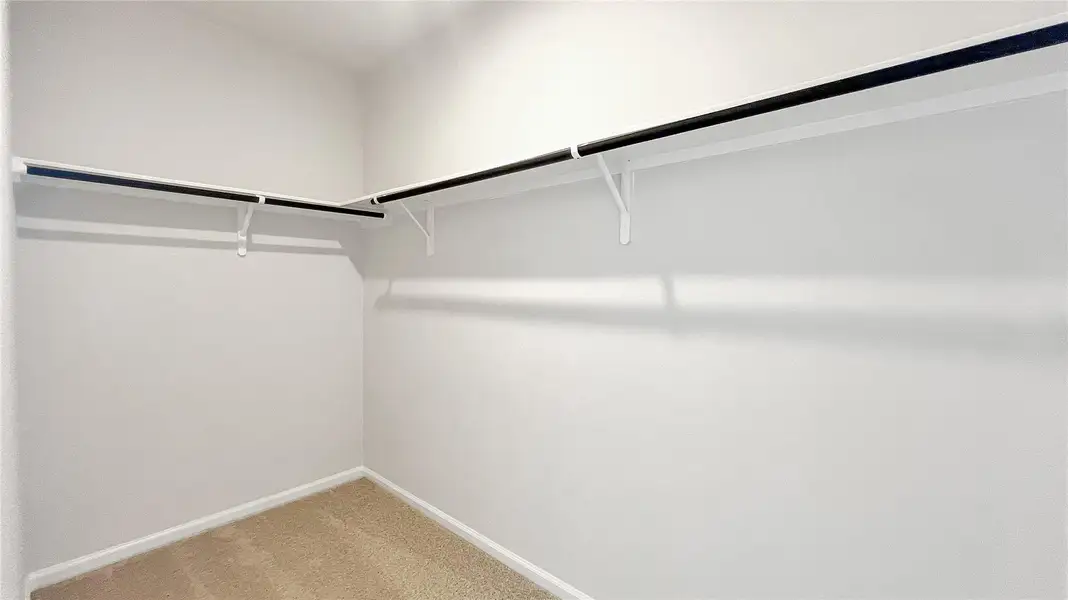 The Pearson- Primary Walk-in Closet. Home under construction. Sample floor plan photo used for illustrative purposes only. Upgrades, selections options, windows and colors may vary.