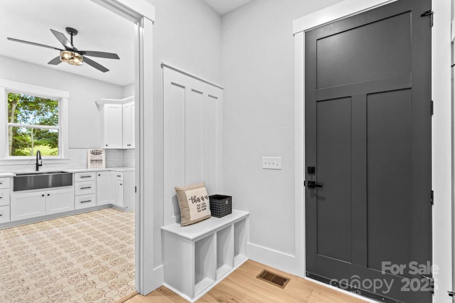 Drop zone area from Garage. Notice 8 ft interior & exterior doors.