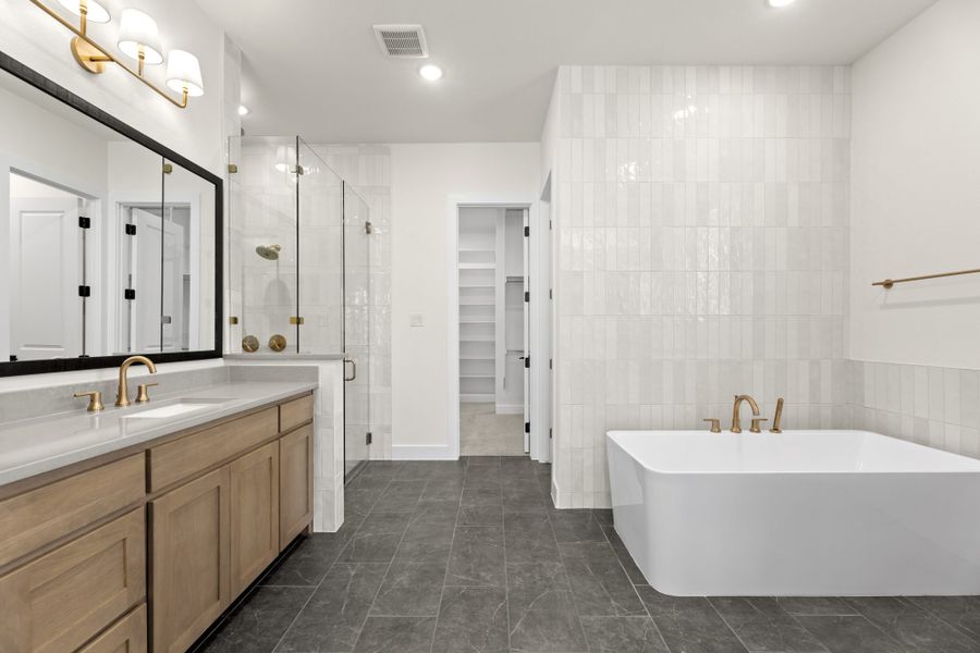 Representative furnished interior of a home built from the 5551 by Tradition Homes in Windsong Ranch, Prosper (Image 10).