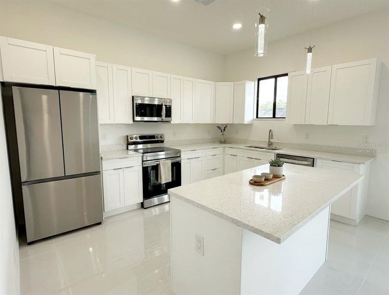 Furnished interior view inside a new home in , Cape Coral (Image 6). Furnished interior view inside a new home in , Cape Coral (Image 6).