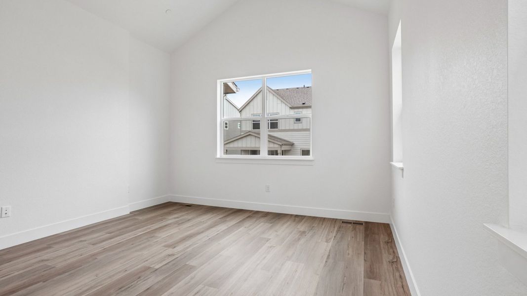 Furnished interior view inside a new home in Dillon Pointe - Journey, Broomfield (Image 17).