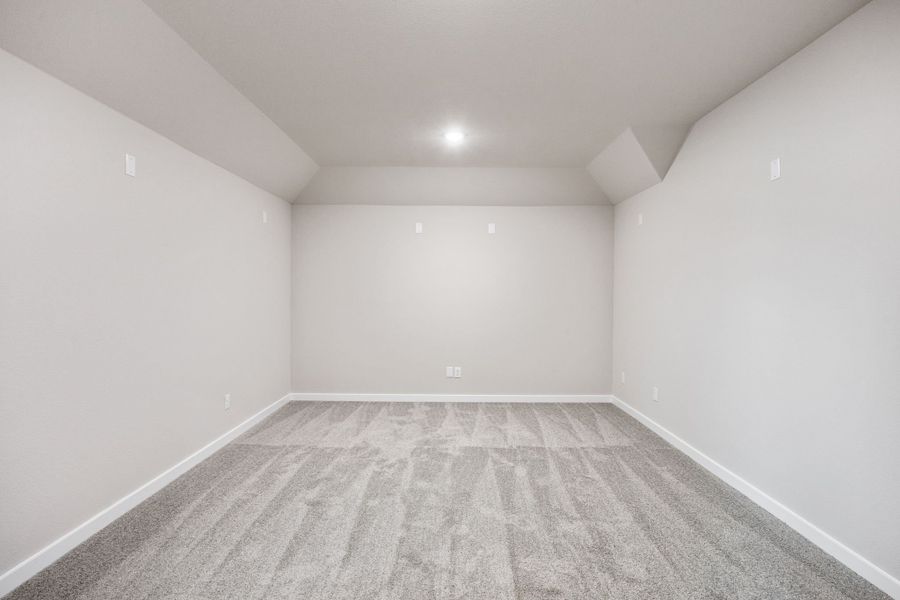 Media Room in the Wimbledon home plan by Trophy Signature Homes – REPRESENTATIVE PHOTO