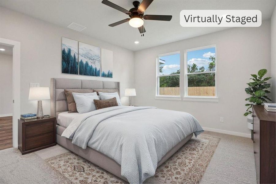 Virtually staged primarybedroom.