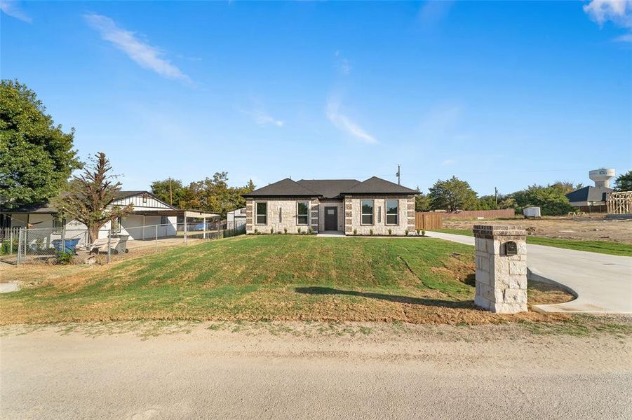 View of front of home with stone siding
