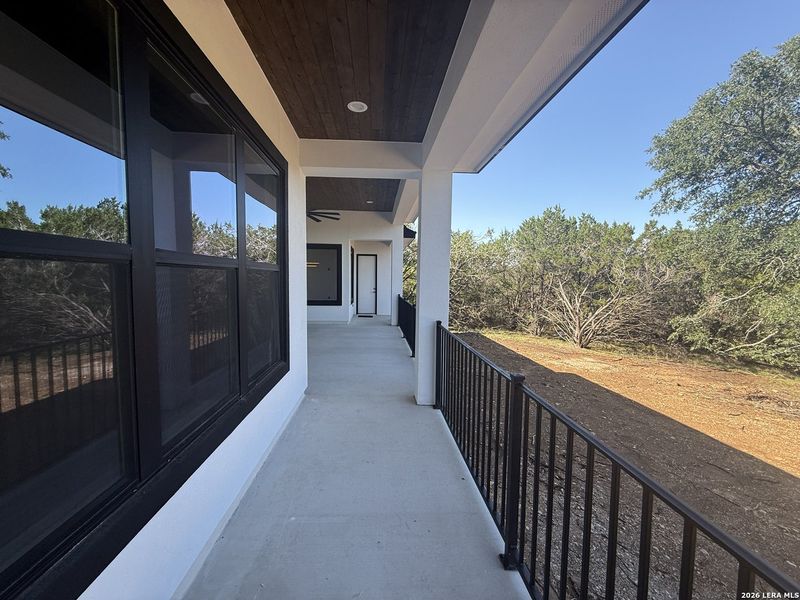 Exterior details and patio area of a home in , Spring Branch (Image 4).