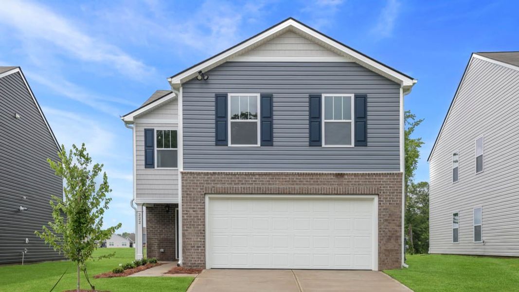 Front exterior of a new home in Durbin Meadows, Fountain Inn, SC, highlighting curb appeal (Image 1). Front exterior of a new home in Durbin Meadows, Fountain Inn, SC, highlighting curb appeal (Image 1).