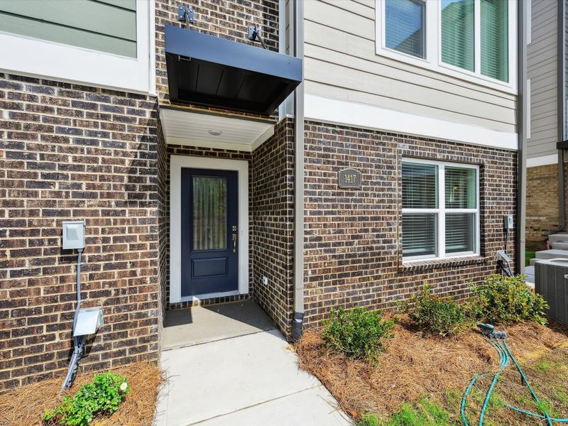 Exterior details and patio area of a home in Central Living at Craig, Charlotte (Image 21). Exterior details and patio area of a home in Central Living at Craig, Charlotte (Image 21).