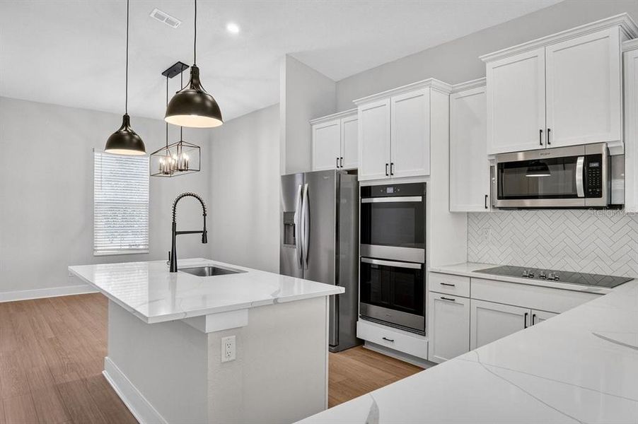 Furnished interior view inside a new home in Stables at Cary Forest, Bryceville (Image 9).