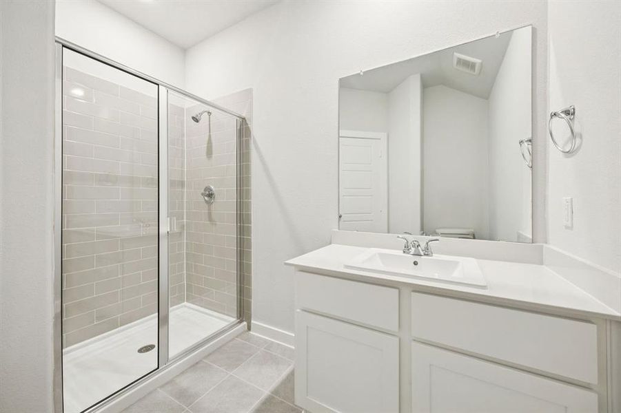 Bathroom in the Masters home plan by Trophy Signature Homes – REPRESENTATIVE PHOTO Bathroom in the Masters home plan by Trophy Signature Homes – REPRESENTATIVE PHOTO