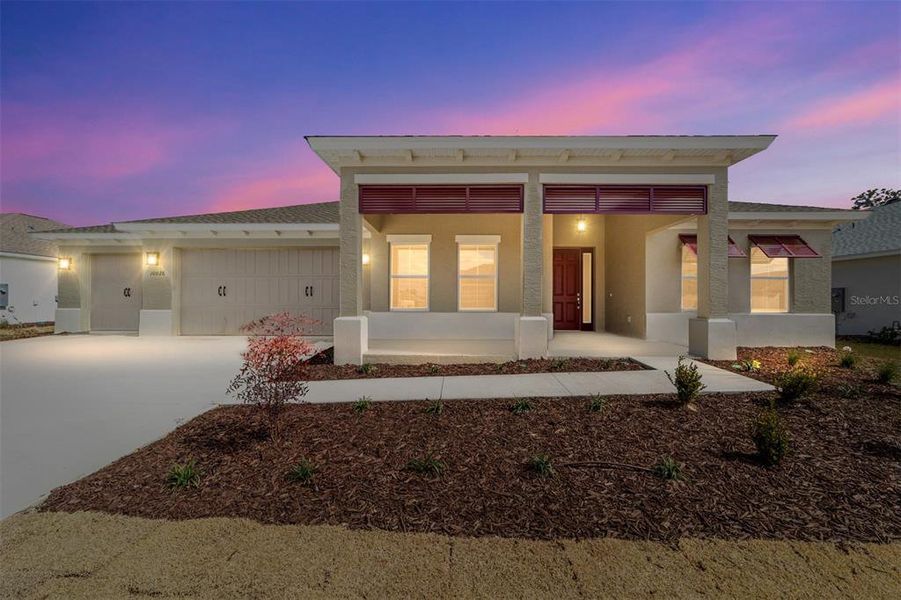 Front exterior of a new home in On Top of the World Communities, Ocala, FL, highlighting curb appeal (Image 22).