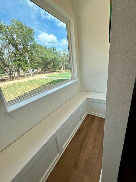 Cute little boot bench near the garage entrance, the tops lift up for deep storage, hooks on the wall Cute little boot bench near the garage entrance, the tops lift up for deep storage, hooks on the wall