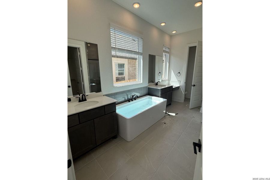 Furnished interior view inside a new home in Prominence 50's, San Antonio (Image 6).