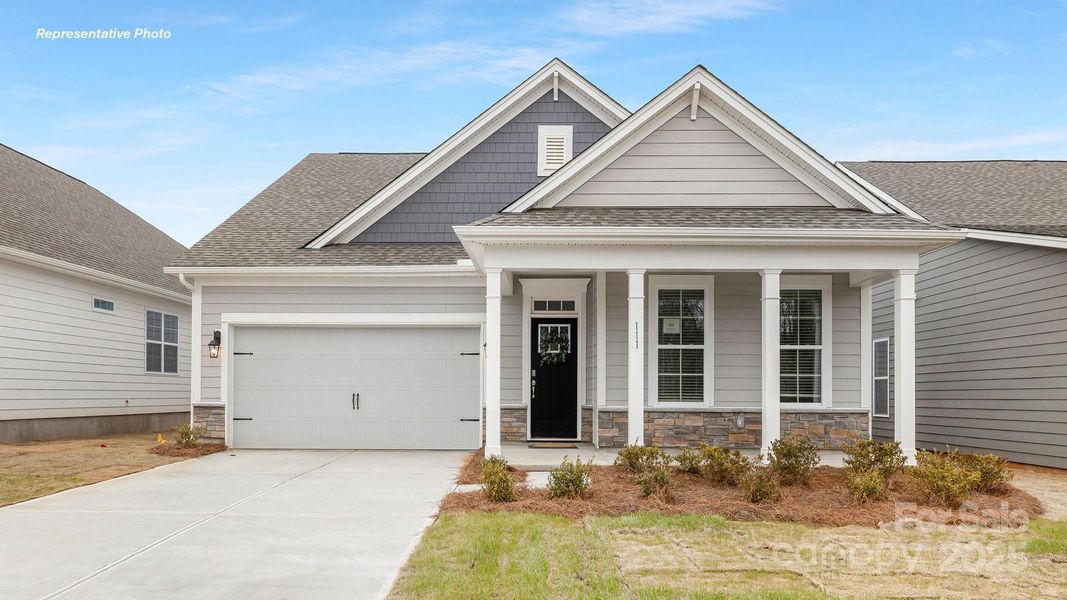 Front exterior of a new home in Westport Freedom Series, York, SC, highlighting curb appeal (Image 1).