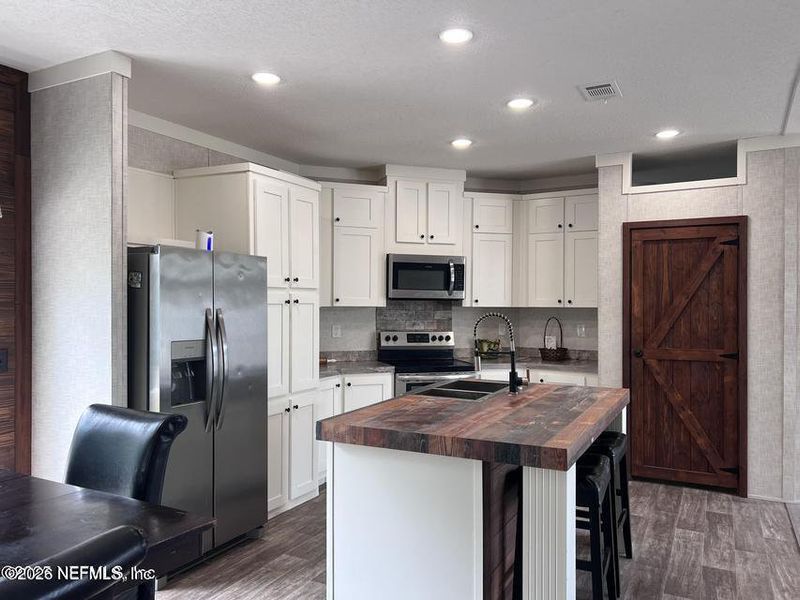 Furnished interior view inside a new home in , Live Oak (Image 3).